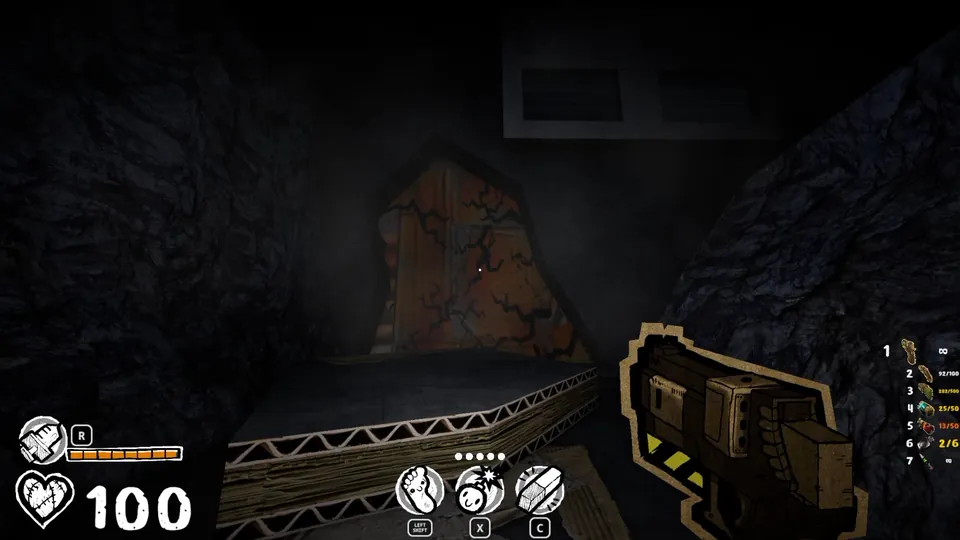 Cardboard-like wall to the right of the destructible wall
