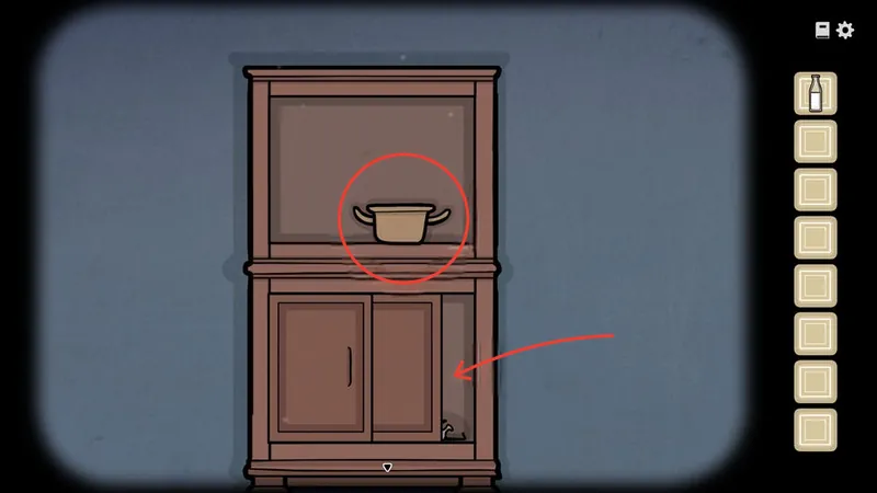 Cabinet with the Small Pot circled on top and an arrow to the lower doors