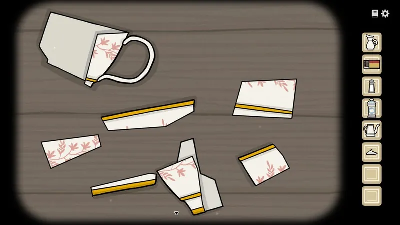 Pieces of the broken tea cup scattered on the floor