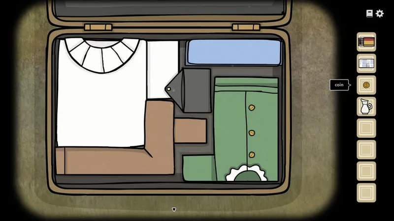 Open suitcase with the clothes fitted together like puzzle pieces